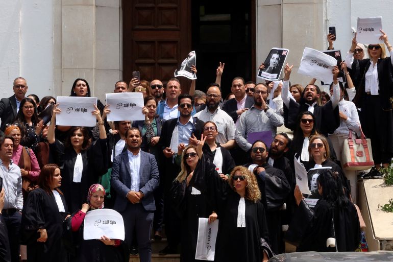 Lawyers carry banners during a protest against the arrest of Sonia Dahmani, a prominent lawyer critical of the president, outside the Palace of Justice building in Tunis, Tunisia May 13, 2024. REUTERS/Jihed Abidellaoui