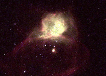 The saying 'X' marks the spot holds true in this NASA Hubble Space Telescope (HST) image released by NASA 04 January, 2001 where Hubble-X marks the location of a dramatic burst of star formation, very much like the Orion Nebula in our Milky Way galaxy, but on a vastly greater scale. Hubble-X is a glowing gas cloud, one of the most active star-forming regions within galaxy NGC 6822. The name Hubble-X does not refer to the shape of the gas cloud, but rather is derived from a catalog of objects in this particular galaxy. The 'X' is actually a Roman numeral designation. The galaxy lies in the constellation Sagittarius at a distance of only 1,630,000 light-years and is one of the Milky Way's closest neighbors. The intense star formation in Hubble-X occurred only about 4 million years ago, a small fraction of the approximate 10 billion year age of the universe. AFP PHOTO NASA and The Hubble Heritage Team (STScI/AURA)