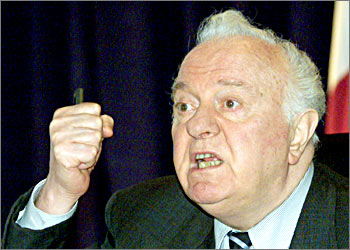 Georgian President Eduard Shevardnadze gestures as he appeals to his people on national TV from his office in Tbilisi, November 14, 2003. Shevardnadze appealed to his people to stay away from a planned mass opposition protest calling for his resignation in connection with disputed election results. REUTERS/David Mdzinarishvili