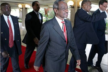 AFP - Sudan first vice President Osman Taha arrives 19 November 2004 in the UN complex in Nairobi where a special session of