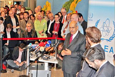 AFP/ Director General of the watchdog UN atomic agency, the International Atomic Energy Agency (IAEA) Mohamed ElBaradei (R) talks to journalists during a press conference