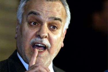 Iraqi Sunni Arab politician Tariq al-Hashimi gestures as he speaks during a news conference following his meeting with President Jalal Talabani in Baghdad February 18, 2006.