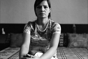 f_ Jirina Dzurkova poses 12 February 2006 in her flat in the eastern city of Ostrava. Dzurkova is one of the 87 Czech gypsies who have lodged complaints against their forced