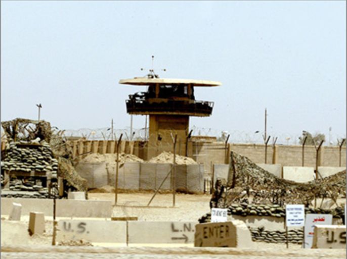 f_An image taken 02 May 2004 shows the entrance of Abu Ghraib prison west of Baghdad. US forces