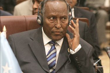 f_Somali President Abdullahi Yusuf Ahmed listens to the closing statements at the final session of