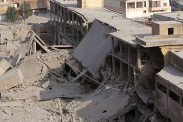 A chocolate factory is seen after it was demolished in southern Beirut on Hizbollah stronghold that was targeted by Israeli air strikes, July 20, 2006.