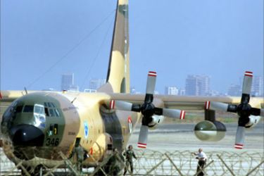 A Jordanian military plane, transporting UN humanitarian aid to conflict-stricken Lebanon, sits on the tarmac at Beirut international airport 26 July 2006