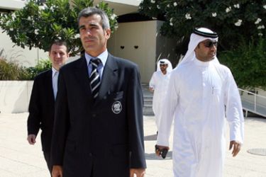 AFP/Argentinian referee, Horacio Elizondo, who officiated at the 2006 World Cup final, walks before a press conference at Qatar university, 18 October 2006 in Doha. Elizondo is to referee a series of games in Qatar. AFP