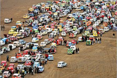 AFP / Renault 4L are parked 20 February 2007 in Merzouga desert, southern Morocco during the Renault 4L rally from France to Africa. On February 15th, two thousand students left France in tiny Renault 4’s, heading for Morocco to mark the 10th