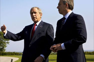 US President George W. Bush and Britain’s Prime Minister Tony Blair address journalists following a bilateral meeting 07 June 2007 on the sidelines of the G8 Summit in Heiligendamm, northeastern Germany