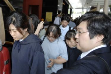 r - Freed South Korean hostages leave the hotel for Dubai airport September 1, 2007, as they make their way home