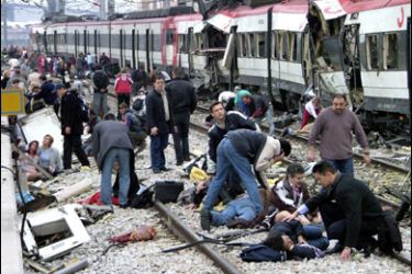 r/The victims of Madrid's train bombing are seen following a bomb blast at Madrid's Atocha station in this file photo taken March 11, 2004. A Spanish court on October 31, 2007 found 21 people guilty of involvement in the bombings,