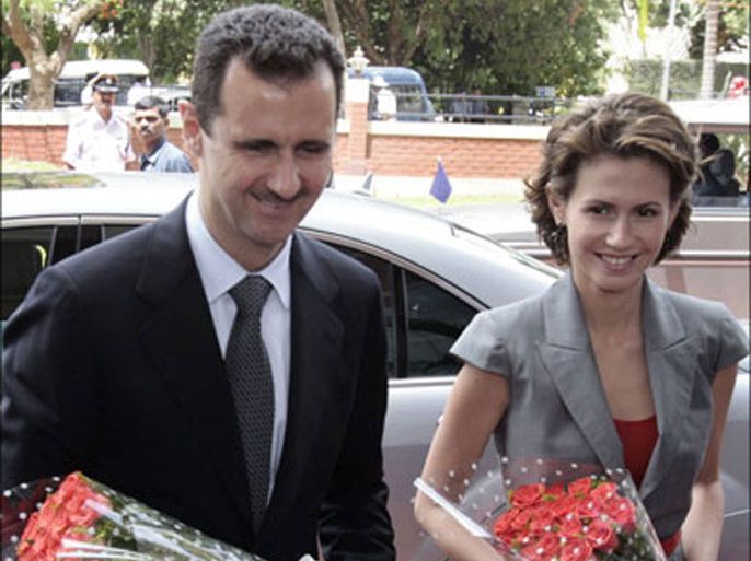afp : Syrian President Bashar al-Assad (L) is accompanied by his wife Asma as they arrive at the Infosys campus in Bangalore on June 20, 2008. Syrian President Bashar al-