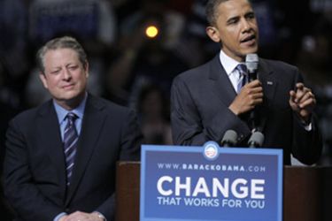 Democratic presidential candidate Sen. Barack Obama (D-IL) (R) speaks as former U.S. vice president Al Gore looks on after Gore spoke endorsing him at a rally at Joe Louis Arena June 16, 2008 in Detroit, Michigan.