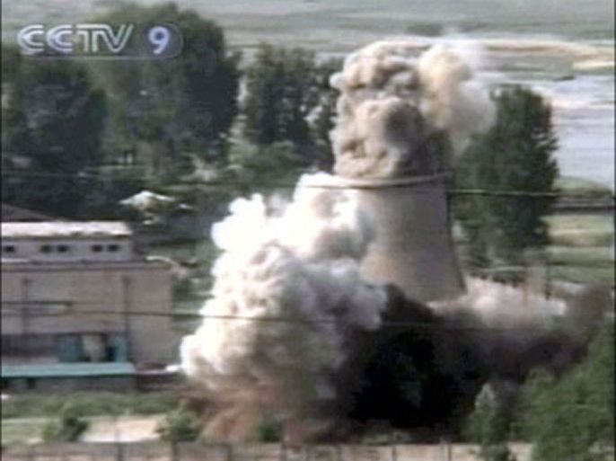afp : This TV footage from the National Chinese Television channel shows the public demolition of North Korea's cooling tower at its Yongbyon nuclear complex on June 27, 2008.