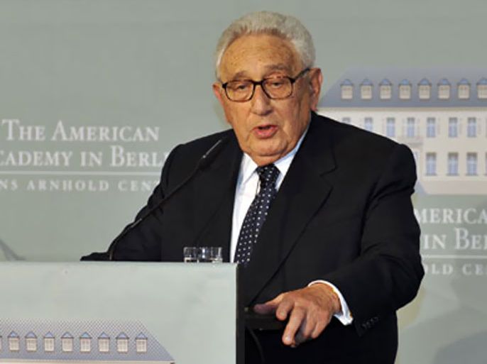 Former US secretary of state Henry Kissinger gives the laudatio for former US president George Bush (not in pictue) during an awards ceremony for the 2nd annual Kissinger