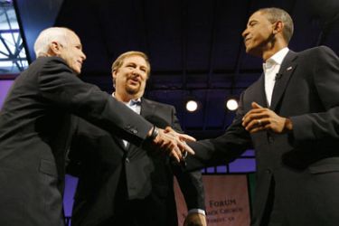 US Republican presidential candidate Senator John McCain (R-AZ) (L) shakes hands with US Democratic presidential candidate Senator Barack Obama (D-IL) (R), as moderator