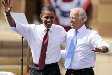 AFP / Democratic presidential candidate US Senator Barack Obama and runnig mate Joe Biden wave during a rally in Springfield, Illinois, onAugust 23, 2008. AFP