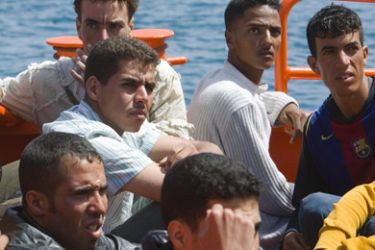 Would-be immigrants on a rescue boat arrive at the port of Arguineguin in Spain's Canary Island of Gran Canaria, September 24, 2008. About 19 would-be immigrants,