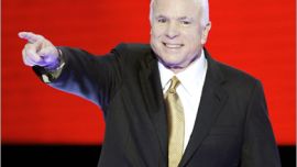 REUTERS/ Republican presidential candidate John McCain (R-AZ) walks on stage to accept his party's nomination