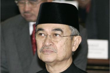 (FILES) This file photo taken on April 28, 2008 shows Malaysian Prime Minister Abdullah Ahmad Badawi cupping his hands in prayer before a closed ceremony where members of parliament were sworn in at the prliament building in Kuala Lumpur.