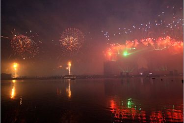 AFP - A firework display lights up the sky around the Atlantis Hotel during the official grand opening party on the Palm Jumeirah in Dubai on November 20, 2008. Dubai is threw a multi-
