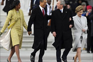 r_U.S. President Barack Obama and first lady Michelle Obama walk with former President George W. Bush and his wife Laura during the departure ceremony at the inauguration
