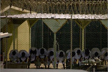 REUTERS / The detainees of Camp 4 assemble for the morning call to prayer in Guantanamo Bay, Cuba in this Cuba National Geographic Television undated handout image. Camp 4 detainees are allowed more freedom to live, pray, eat and recreate together. The-day-to-day tensions between Guatanamo military prison inmates -- some of whom charge torture -- and the troops who guard them are vividly depicted