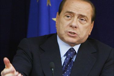 Italy's Prime Minister Silvio Berlusconi addresses a news conference at the end of a two-day EU heads of state summit in Brussels June 19, 2009.