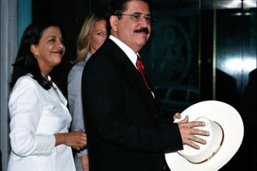 afp : WASHINGTON - JULY 7: Deposed Honduran President Manuel Zelaya (R) arrives at the U.S. State Department for a meeting with U.S. Secretary of State Hillary Rodham Clinton