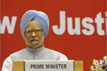 Indian Prime Minister Manmohan Singh listens to the speech of Indian Minister of Law & Justice M. Veerappa Moily during the inauguration of the Joint Conference of Chief Ministers of the States and Chief Justices of the High Courts in New Delhi on August 16, 2009.
