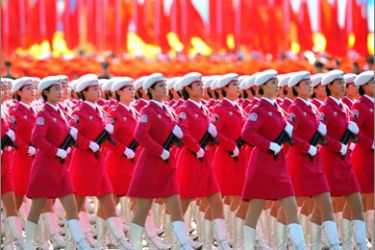 Chinese women militias march by Tiananmen Square during the National Day parade in Beijing on October 1, 2009. AFP PHOTO/FREDERIC J. BROWN