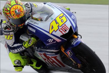 World Champion Italian rider Valentino Rossi competes in the Malaysian Motorcycle Grand Prix at the Sepang racing circuit on October 25, 2009. Defending world champion Rossi claimed his seventh