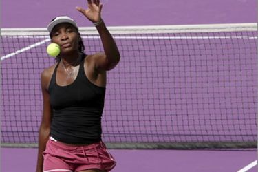 Venus Williams of the united States, trains for the WTA Championships at the Khalifa Tennis Complex in the Qatari capital Doha on October 26, 2009.