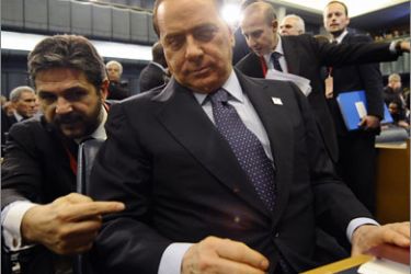 Italian Prime Minister Silvio Berlusconi (C) takes place for the inaugural ceremony of a World Summit on Food Security organized by the Food and Agriculture Organization (FAO) on November 16, 2009