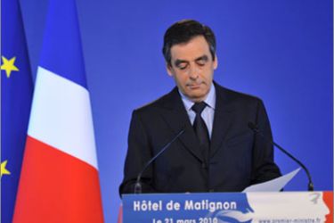 France's Prime Minister Francois Fillon ends his speech at his Hotel Matignon offices in Paris following the close of polls in the second round regional voting