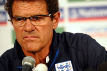 England's coach Fabio Capello speaks during a press conference in Rustenburg on June 28, 2010 a day after losing to Germany in their final game of the 2010 World Cup football tournament. Capello insisted he will continue in his role as England manager.