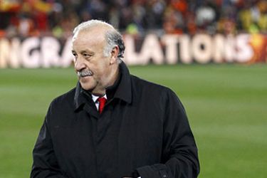 Spain's coach Vicente del Bosque stands on the pitch after their 2010 World Cup final soccer match against Netherlands at Soccer City stadium in Johannesburg July 11, 2010. REUTERS