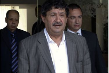 r_Libyan Foreign Minister Abdelati Obeidi (C) leaves after his meeting with Cypriot Foreign Minister Markos Kyprianou in Nicosia April 14, 2011. REUTERS