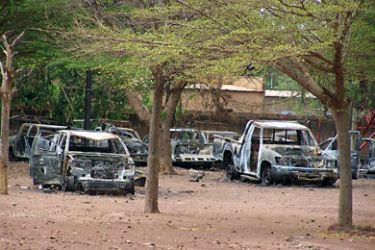 f_A picture taken on April 14, 2011 shows burnt vehicles near the premises of the High Commissioner building in Koudougou after violent student demonstrations