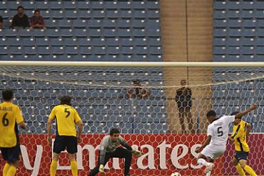 Qatar's Al-Sadd player Majdi Siddiq (5) scores a goal against Saudi Al-Nasr team during their AFC Champions League Group B match at the Sheikh Jassim Bin Hamad Stadium in Riyadh on April 19, 2011. Al-Sadd beat Al-Nasr 1-0. AFP