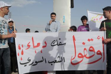 من الاعتصام امام السفارة السورية بعمان