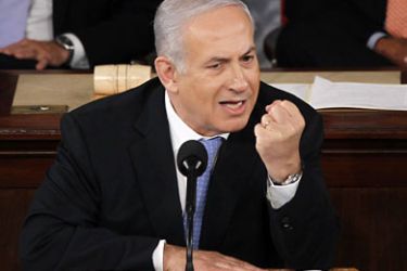 Israel's Prime Minister Benjamin Netanyahu makes a point as he addresses a joint meeting of Congress in Washington, May 24, 2011