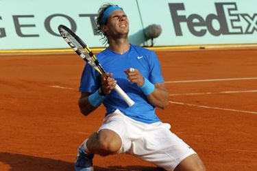 afp-Spain's Rafael Nadal reacts after winning over Switzerland's Roger Federer during their men's final