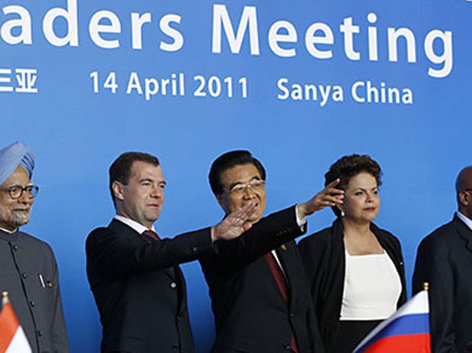 Indian Prime Minister Manmohan Singh (L), Russian President Dmitry Medvedev (2-L), Chinese President Hu Jintao (C), Brazilian President Dilma Rousseff (2-R)and South African President Jacob Zuma (R) attend a joint news conference during the BRICS (Brazil, Russia, India, China and South Africa) Summit in Sanya of Hainan Province, China 14 April 2011.