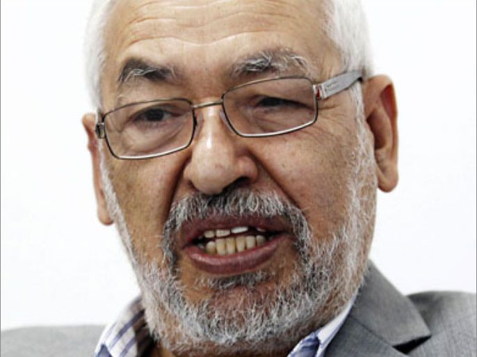 Rached Ghannouchi, leader of the Islamist Ennahda movement, speaks with a Reuters journalist in Tunis October 2, 2011