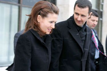 MOSCOW, RUSSIA - JANUARY 25: Syrian President Bashar Assad and his wife Asma Assad are seen during a visit to Moscow's State Institute for Foreign Relations on January 25, 2005. Assad was awarded with a honorary doctorate. (Photo by Salah Malkawi/ Getty Images)
