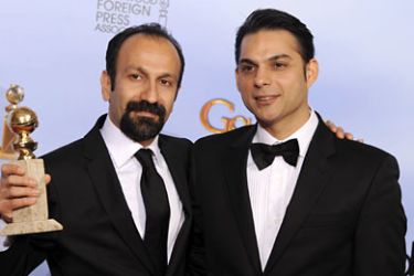 epa03061625 Iranian director Asghar Farhadi (L) and actor Peyman Moaadi (R) pose with the Golden Globe award for Best Foreign Language Film for 'A Separation' (Iran) in the Press Room at the 69th Golden Globe Awards held at the Beverly Hilton Hotel in Beverly Hills, Los Angeles, California, USA, 15 January 2012. EPA/PAUL BUCK
