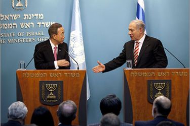 Israeli Prime Minister Benjamin Netanyahu (R) gestures during a joint press conference with UN Secretary-General Ban Ki-moon (L) in Jerusalem on February 1, 2012. Ban called on Israel to create a "positive dynamic" to help kickstart stalled talks with the Palestinians, as he arrived in Jerusalem to urge a resumption of negotiations. AFP PHOTO/POOL/URIEL SINAI