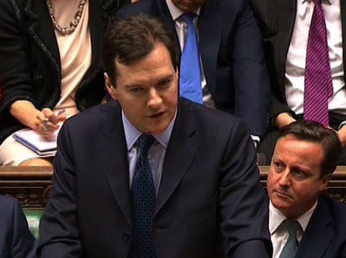 DAN343 - London, Greater London, UNITED KINGDOM : A still image taken from handout video footage provided by UK Parliament’s Parliamentary Recording Unit (PRU) on March 21, 2011 shows British Chancellor of the Exchequer George Osborne (L) presenting the annual budget to parliament as British Prime Minister David Cameron (C) and Chief Secretary to the Treasury Danny Alexander (R) listen in the House of Commons in London. Britain's finance minister George Osborne pledged the government's "unwavering commitment" to slashing the nation's deficit, in a budget that also cut the top rate of income tax. RESTRICTED TO EDITORIAL USE - MANDATORY CREDIT " AFP PHOTO / PRU " - NO MARKETING NO ADVERTISING CAMPAIGNS - NO RESALE - NO DISTRIBUTION TO THIRD PARTIES - 24 HOURS USE ONLY - NO ARCHIVES